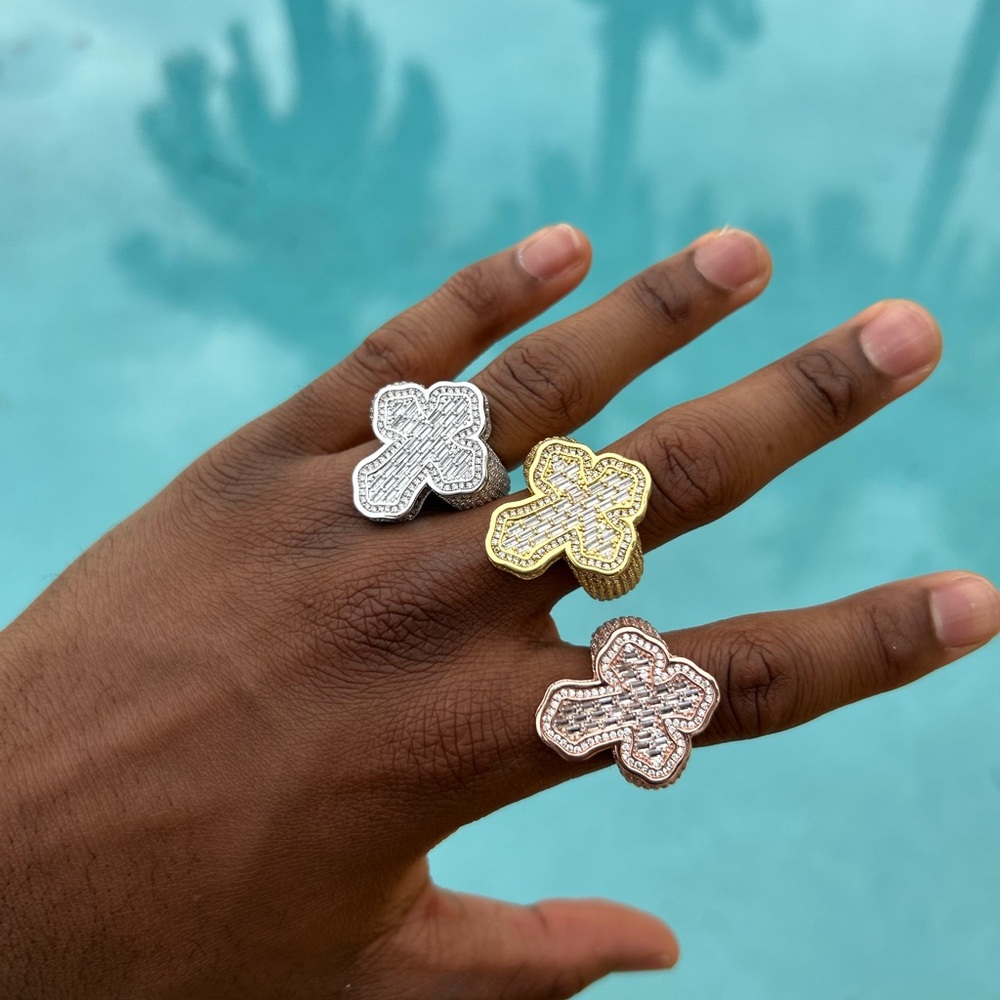 Elegant Cross Rings Set in Silver, Gold, and Brown